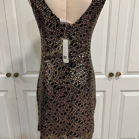 Romeo and Juliet Couture Sleeveless Sequined Black and Gold, Party Dress. - Picture 5 of 14